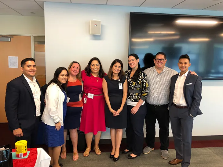 The problem with abundance and resourcefulness: Hispanic Heritage Speech at CDW Recap - Ariel Coro et al. posing for a photo - Social group